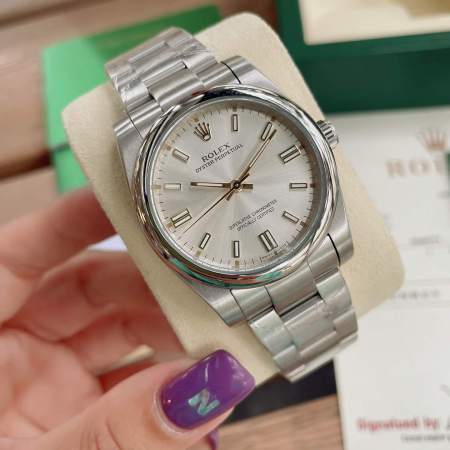Rolex Oyster Perpetual With silver sunburst dial