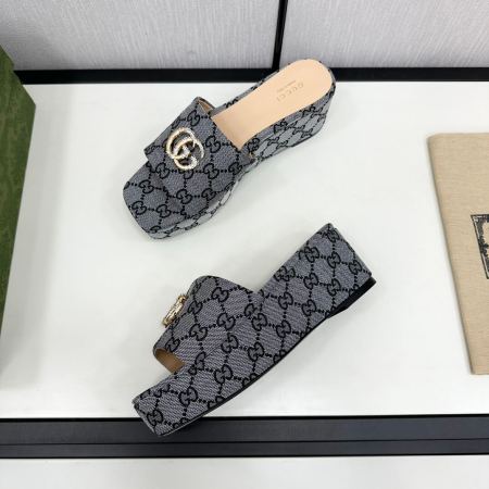 Gucci Double G Monogram Platform Slides in Black Canvas.