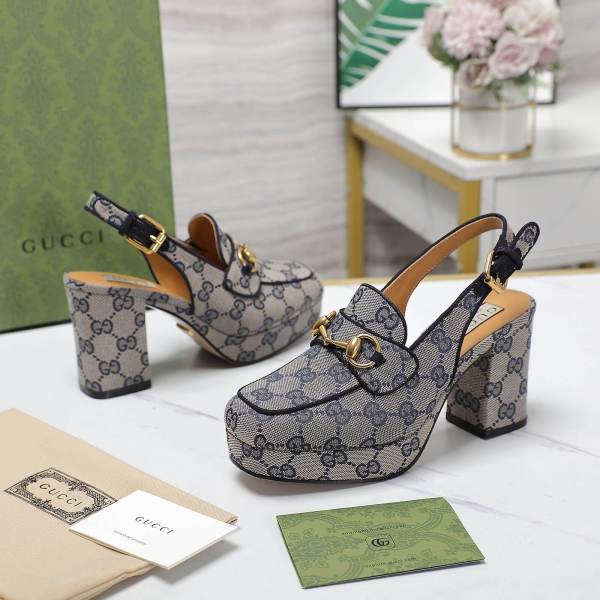 Gucci GG Monogram Canvas Horsebit Mid-Heel Slingback Pumps in Blue.