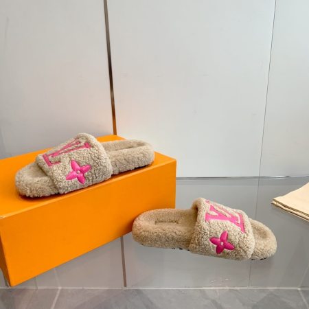 Louis Vuitton Pillow Comfort Flat Mule in Beige Shearling with Pink LV Logo.