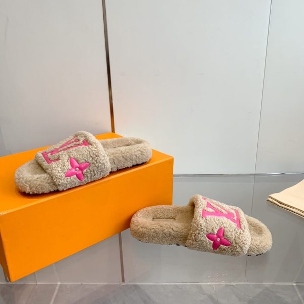 Louis Vuitton Pillow Comfort Flat Mule in Beige Shearling with Pink LV Logo.