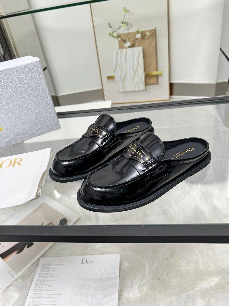 Dior Boy Loafer Mules in Black Patent Leather.
