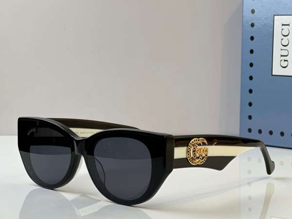 Gucci GG0096S Cat-Eye Sunglasses – Black with Gold Logo