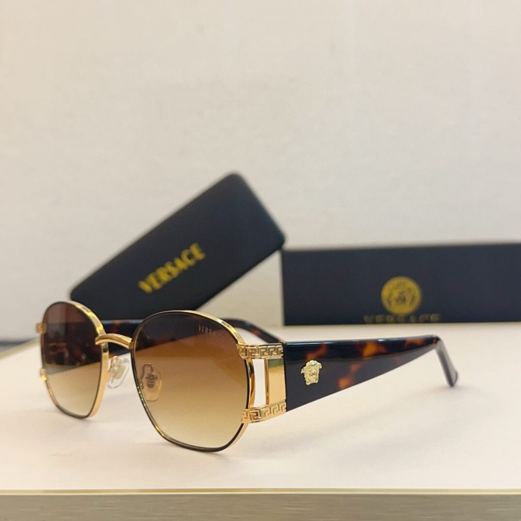 Versace S61 030 Women's Sunglasses – Elegant Metal Frame with Greek Key Detailing in Light Blue, Tortoiseshell, Red, and Black Gradient