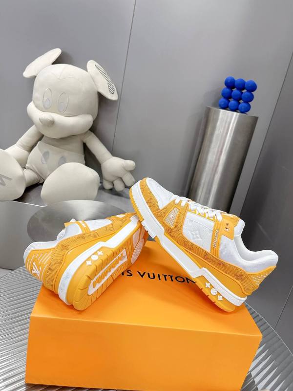 Louis Vuitton LV Trainer Sneaker in White Leather/Orange Monogram Canvas