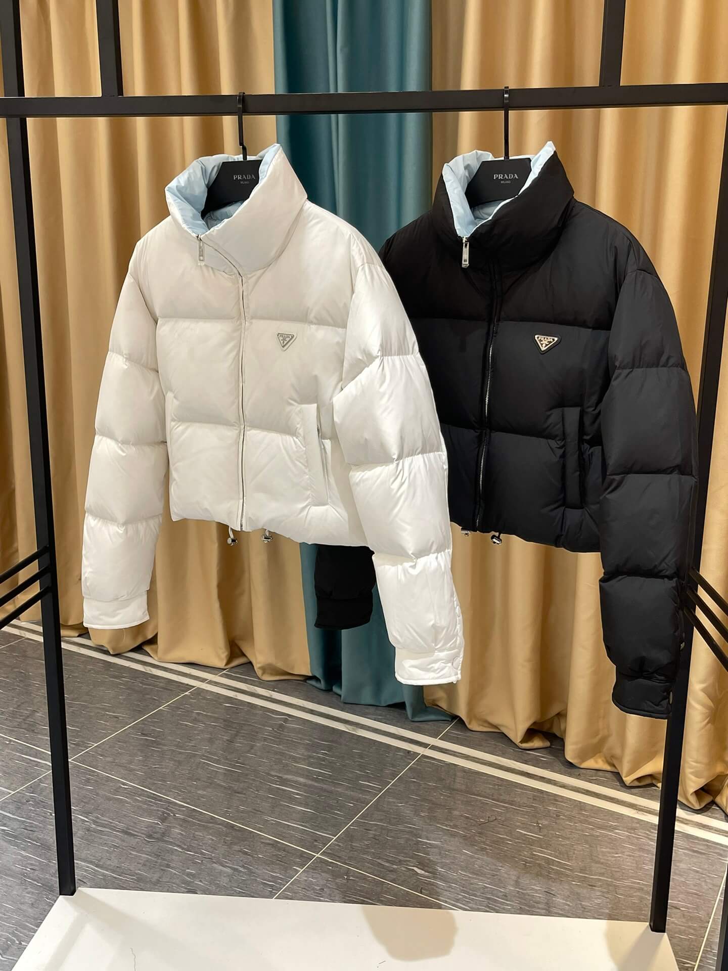 Prada Re-Nylon Cropped Down Jacket in White - Image 2