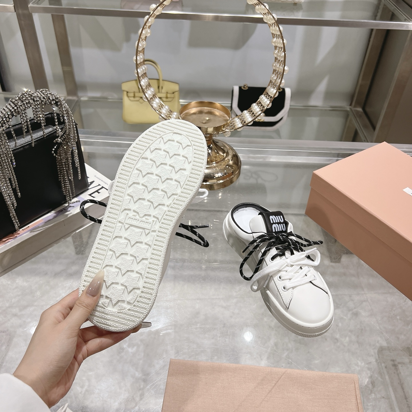 Miu Miu Double Lace Slip-On Sneakers in White with Black Accents - Image 10