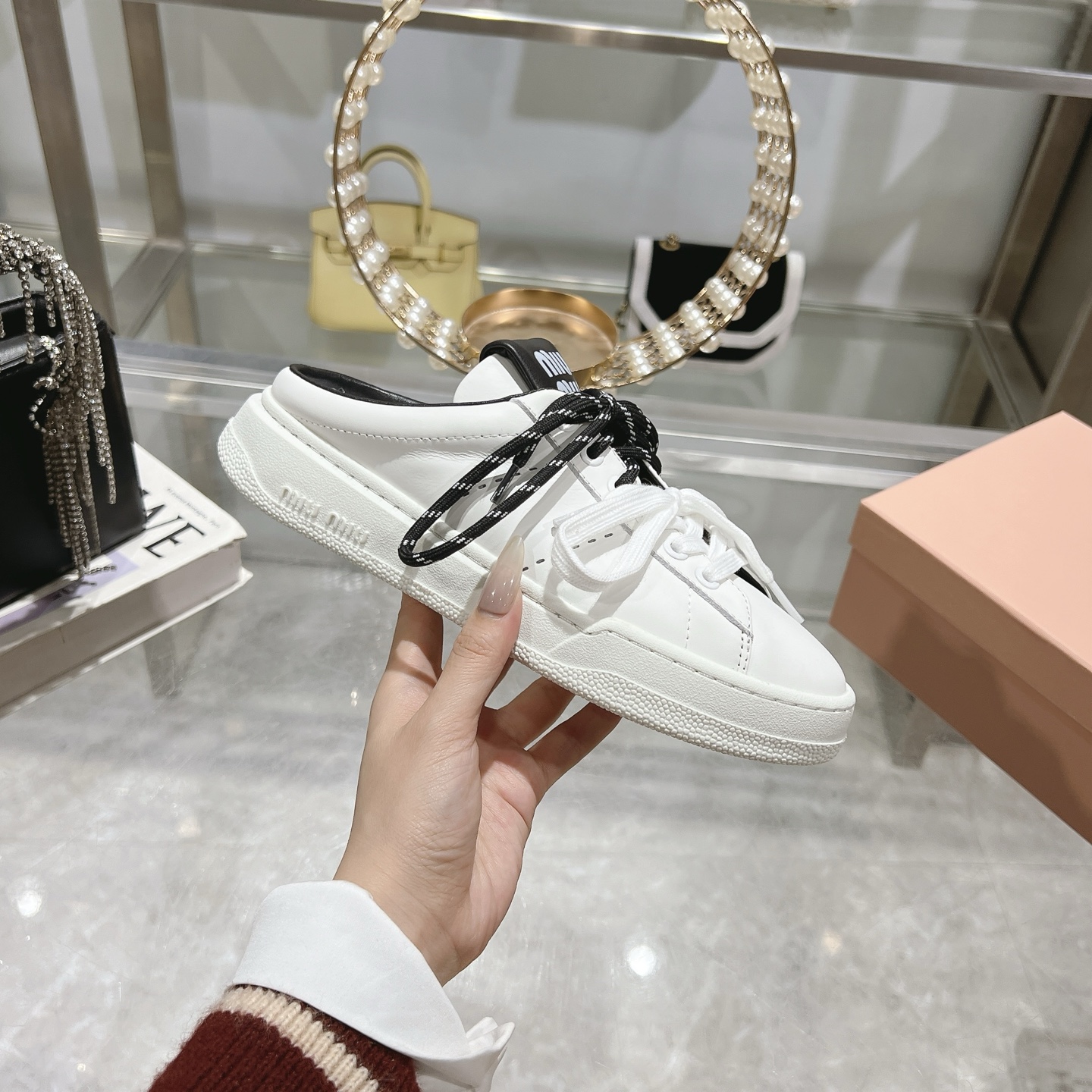 Miu Miu Double Lace Slip-On Sneakers in White with Black Accents - Image 6
