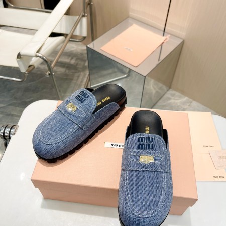 Miu Miu Blue Denim Loafers with Gold Emblem