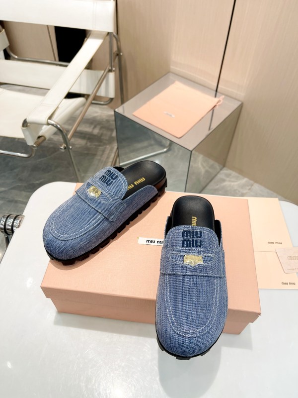 Miu Miu Blue Denim Loafers with Gold Emblem