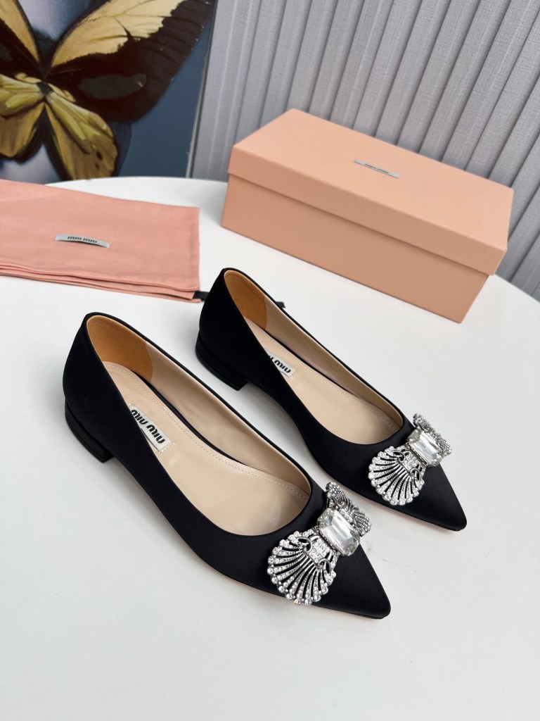 Miu Miu Black Crystal-Bow Pointed-Toe Flats.