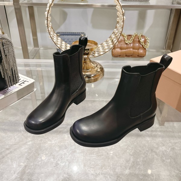 Miu Miu Classic Leather Chelsea Black Boots
