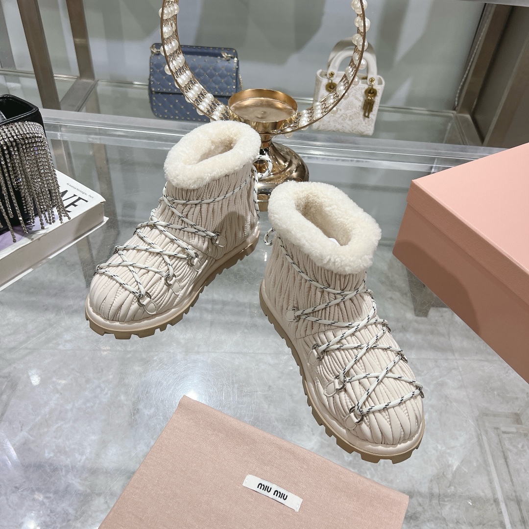Miu Miu Ivory shearling après-ski boots - Image 9