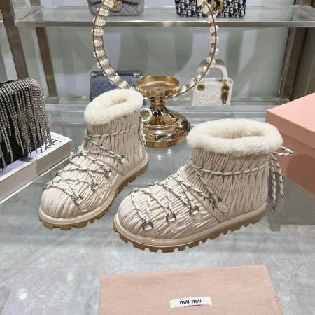 Miu Miu Ivory shearling après-ski boots