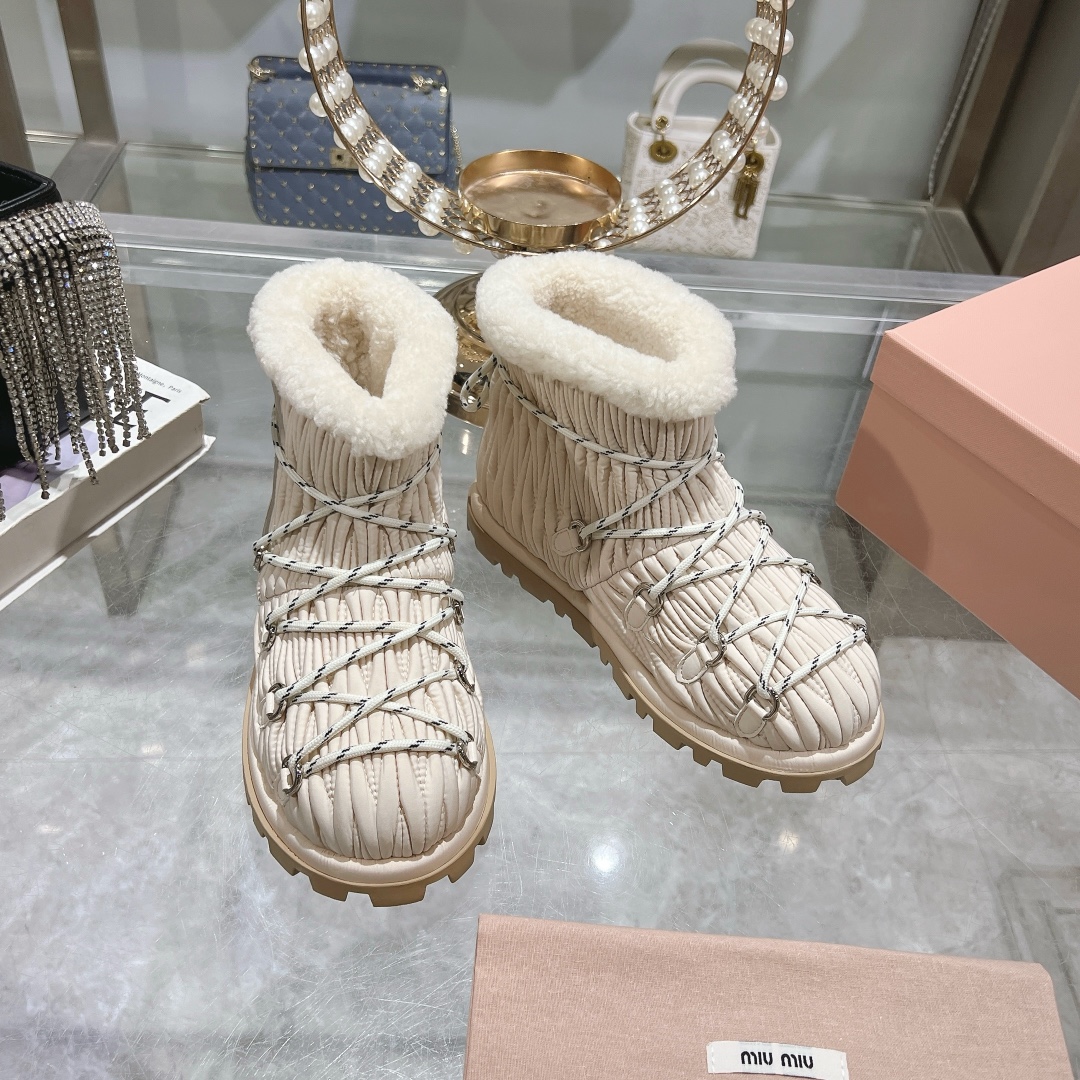 Miu Miu Ivory shearling après-ski boots - Image 3