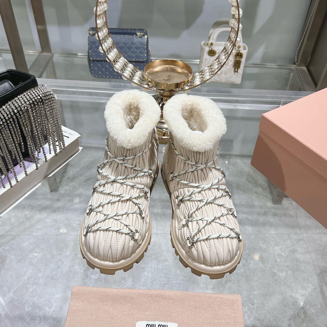 Miu Miu Ivory shearling après-ski boots - Image 2