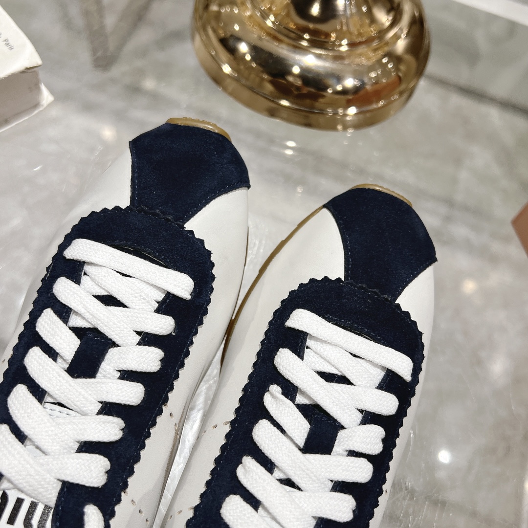 Miu Miu Plume in White and Navy Blue Sneakers - Image 8