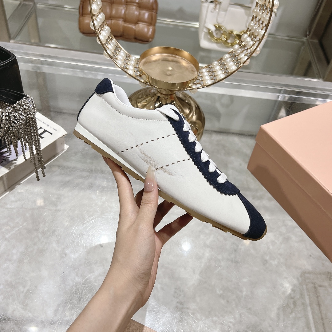 Miu Miu Plume in White and Navy Blue Sneakers - Image 7