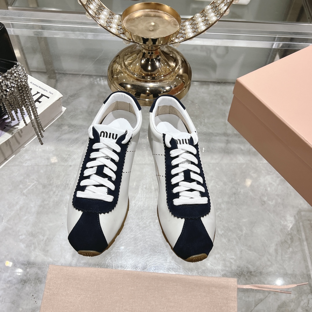 Miu Miu Plume in White and Navy Blue Sneakers - Image 2