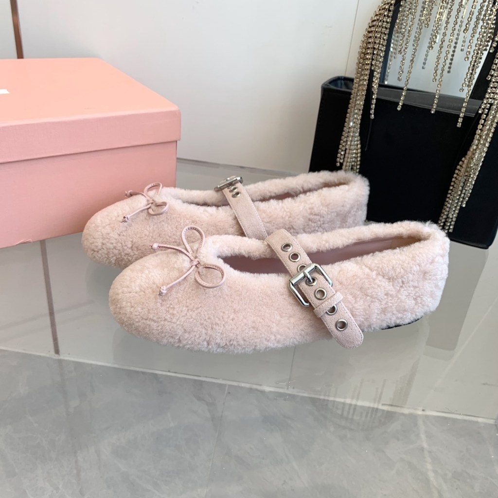 Miu Miu Pink Shearling Ballerinas Flats.