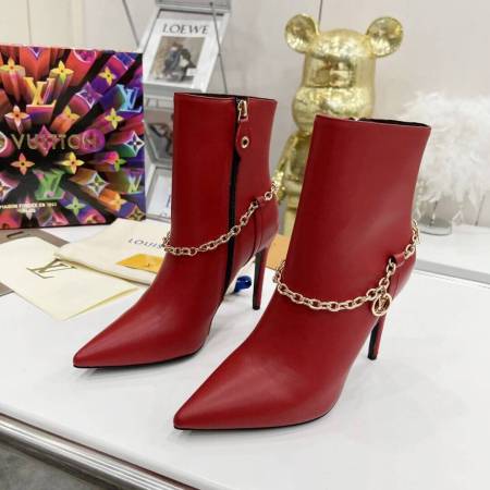 a pair of Red Louis Vuitton Mansion Chain Ankle Boots