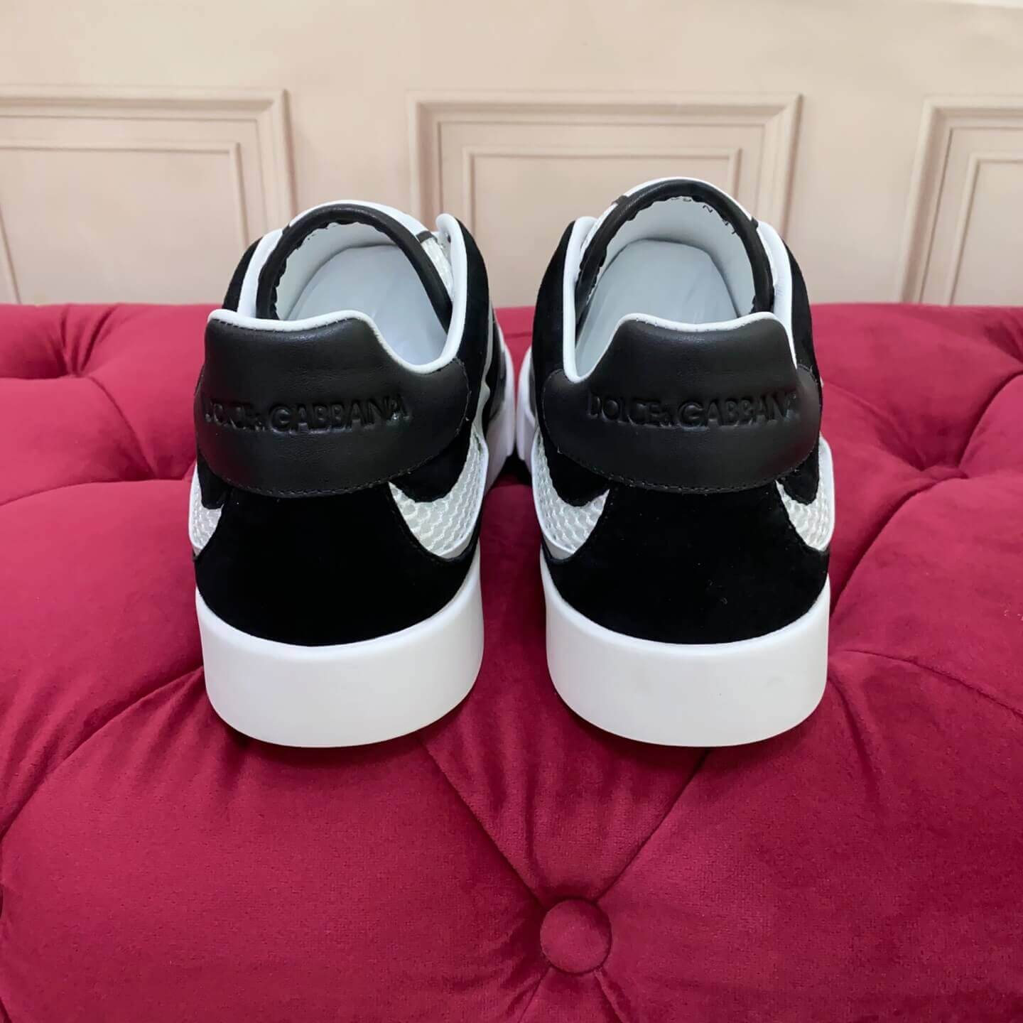 Dolce & Gabbana Men's/Unisex Calfskin Strobel Portofino Light low-Top Sneakers - Black, Grey & White with bold DG logo detailing.