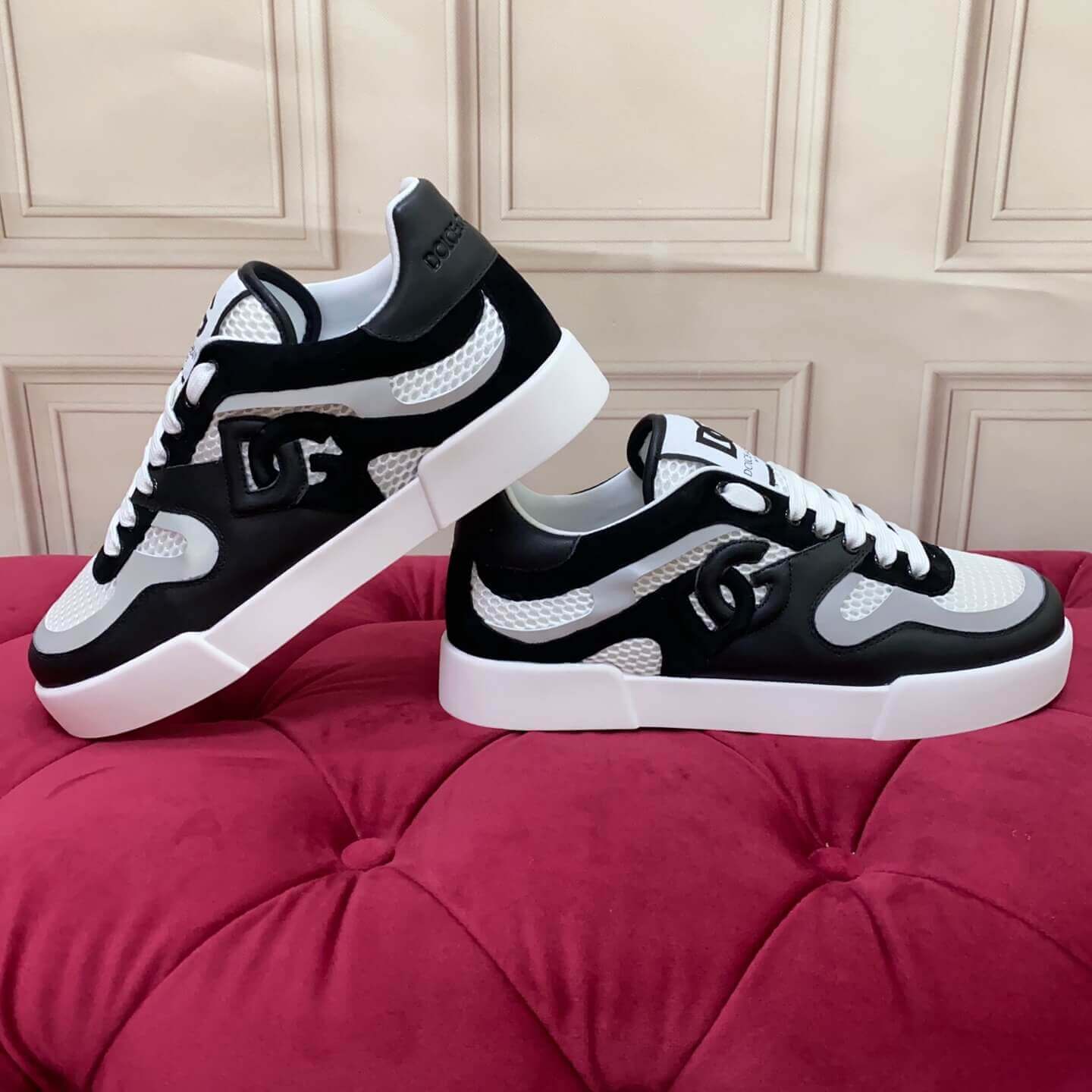 Dolce & Gabbana Men's/Unisex Calfskin Strobel Portofino Light low-Top Sneakers - Black, Grey & White with bold DG logo detailing.