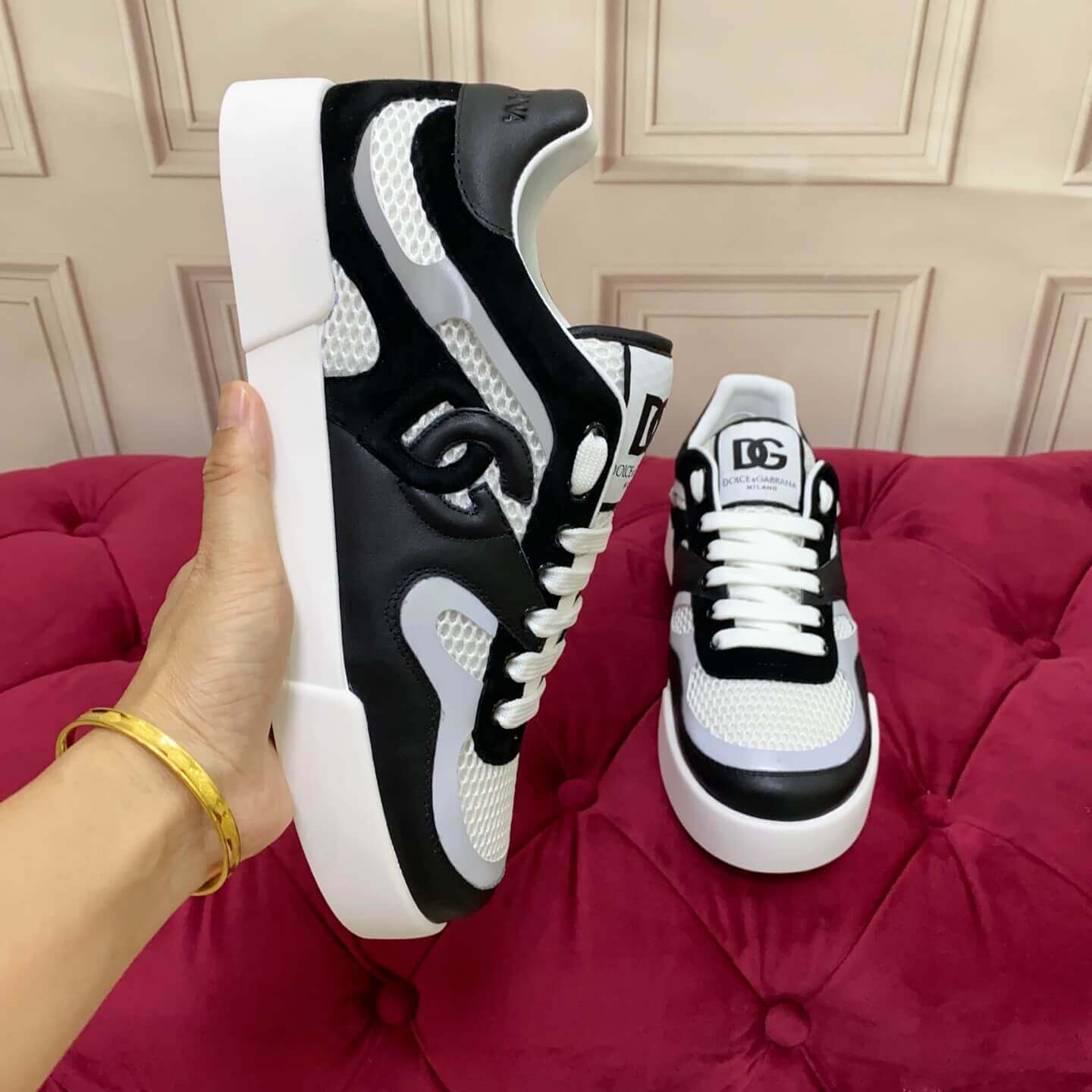 Dolce & Gabbana Men's/Unisex Calfskin Strobel Portofino Light low-Top Sneakers - Black, Grey & White with bold DG logo detailing.