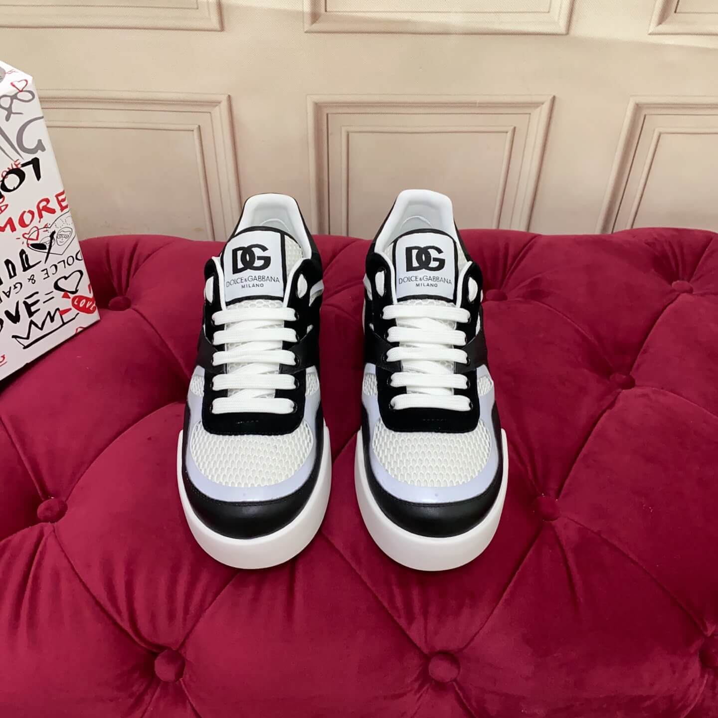 Dolce & Gabbana Men's/Unisex Calfskin Strobel Portofino Light low-Top Sneakers - Black, Grey & White with bold DG logo detailing.