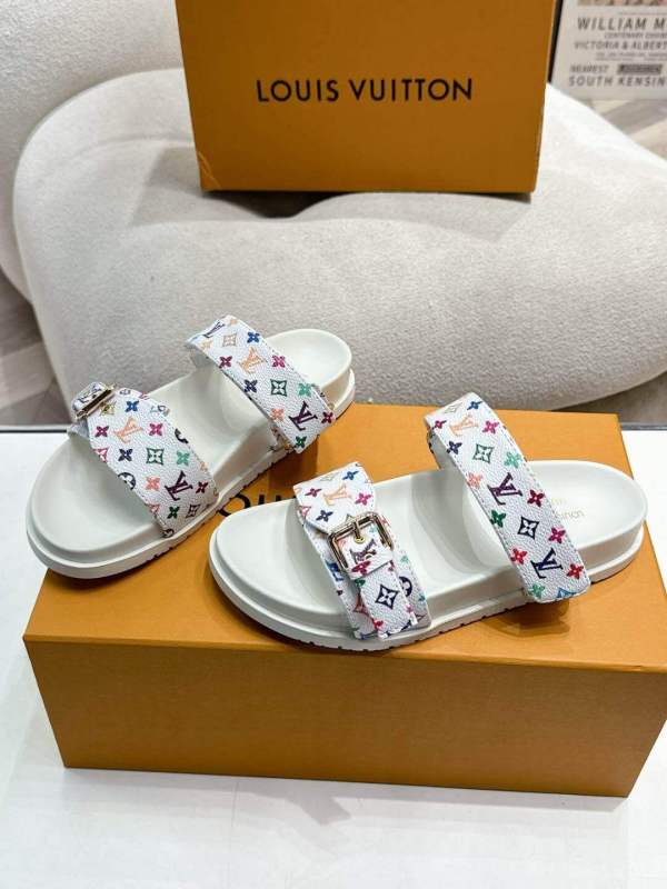 a pair of LV x TM Bom Dia Flat Comfort Mule – Inspired by Louis Vuitton on a box