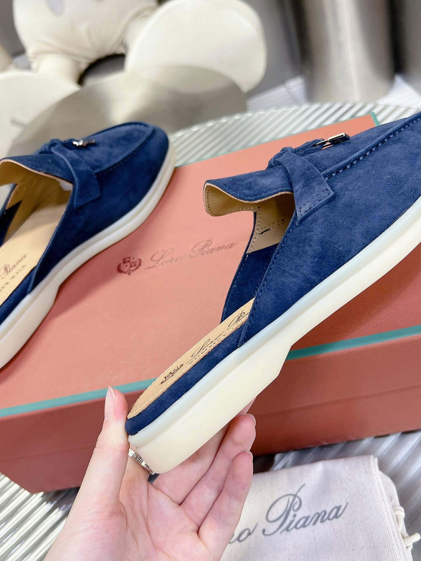 Loro Piana Men's/Unisex Babouche Charms Walk Loafers in Navy Blue Suede, displayed on a box.