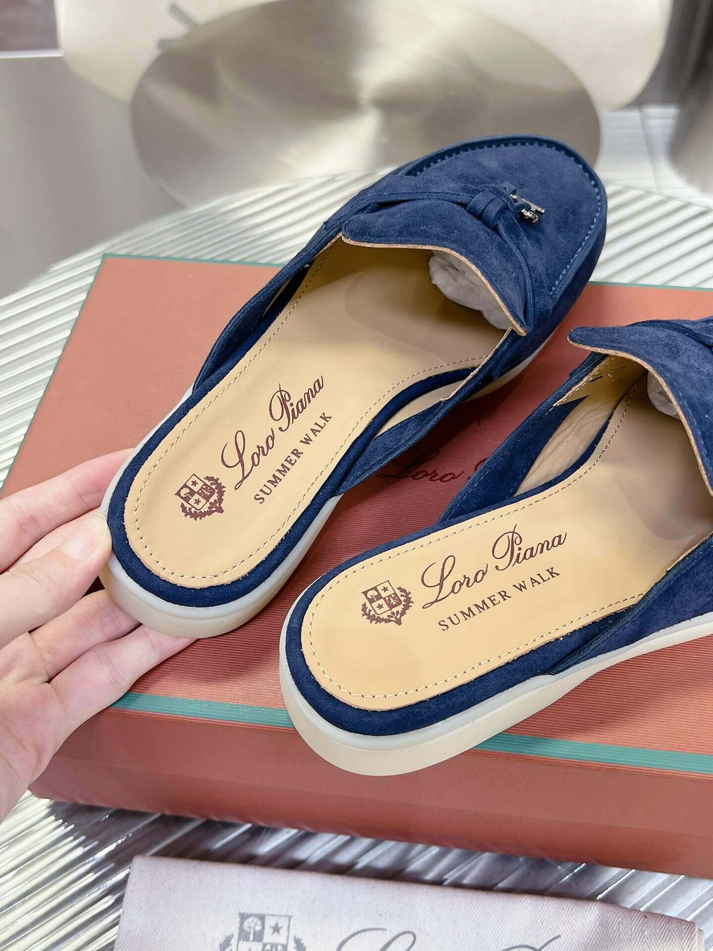 Loro Piana Men's/Unisex Babouche Charms Walk Loafers in Navy Blue Suede, displayed on a box.