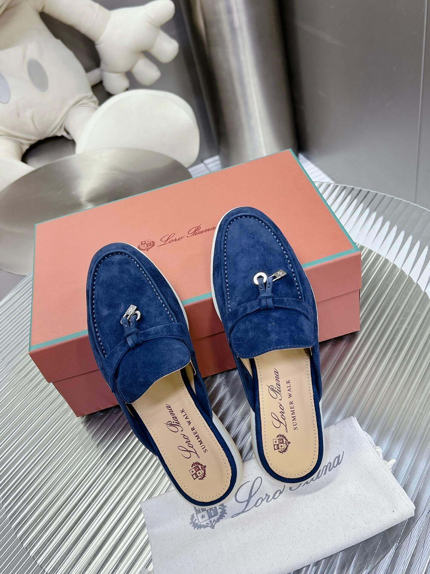 Loro Piana Men's/Unisex Babouche Charms Walk Loafers in Navy Blue Suede, displayed on a box.