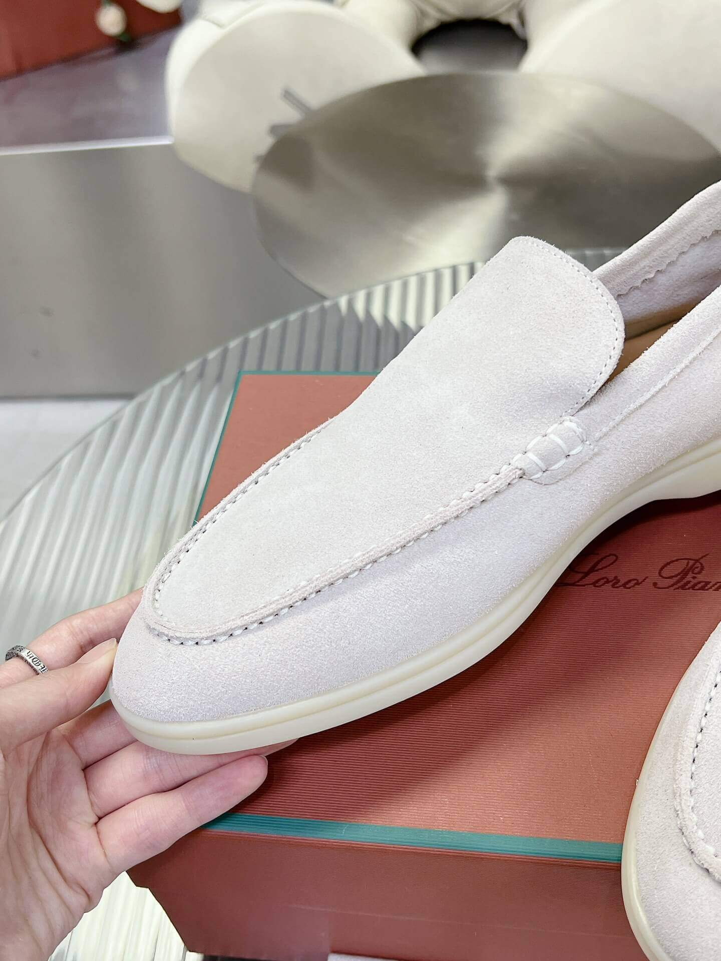 Loro Piana Men's/Unisex Summer Walk Loafers in White Suede, displayed on a box