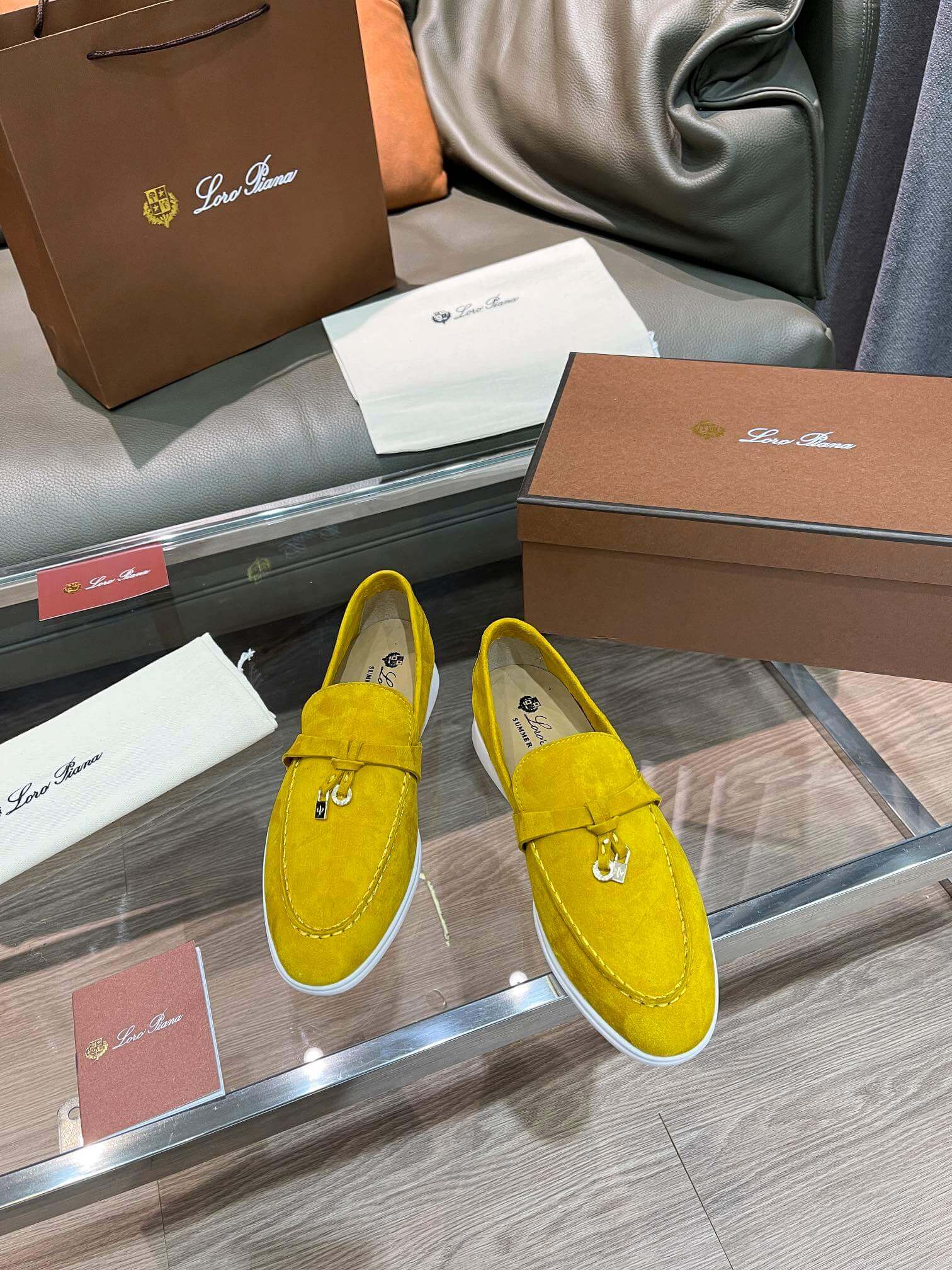 Loro Piana Unisex Summer Charms Walk Loafers - Yellow Suede with white soles, displayed with packaging