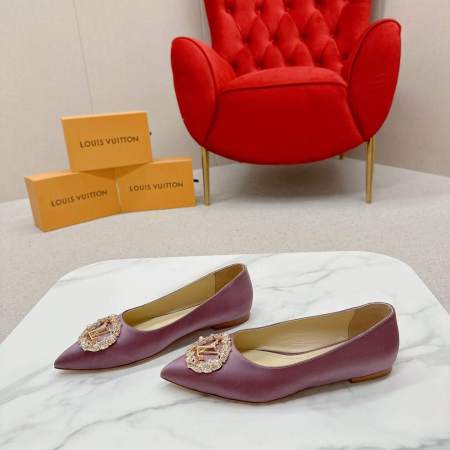 a pair of Louis Vuitton-Inspired Satin Jeweled Flats – Purple on a marble surface