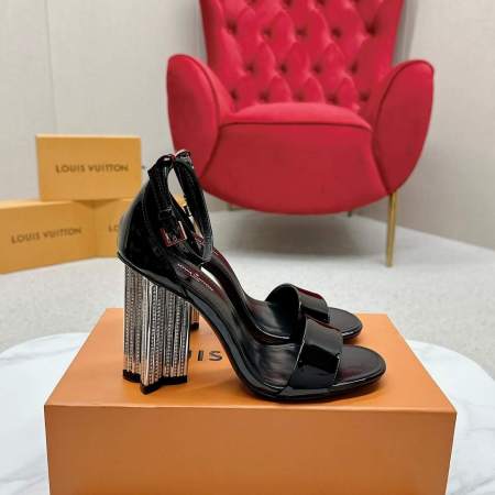a Louis Vuitton Black Patent Leather Silhouette Sandals with Crystal‑Fringe Block Heels on a box