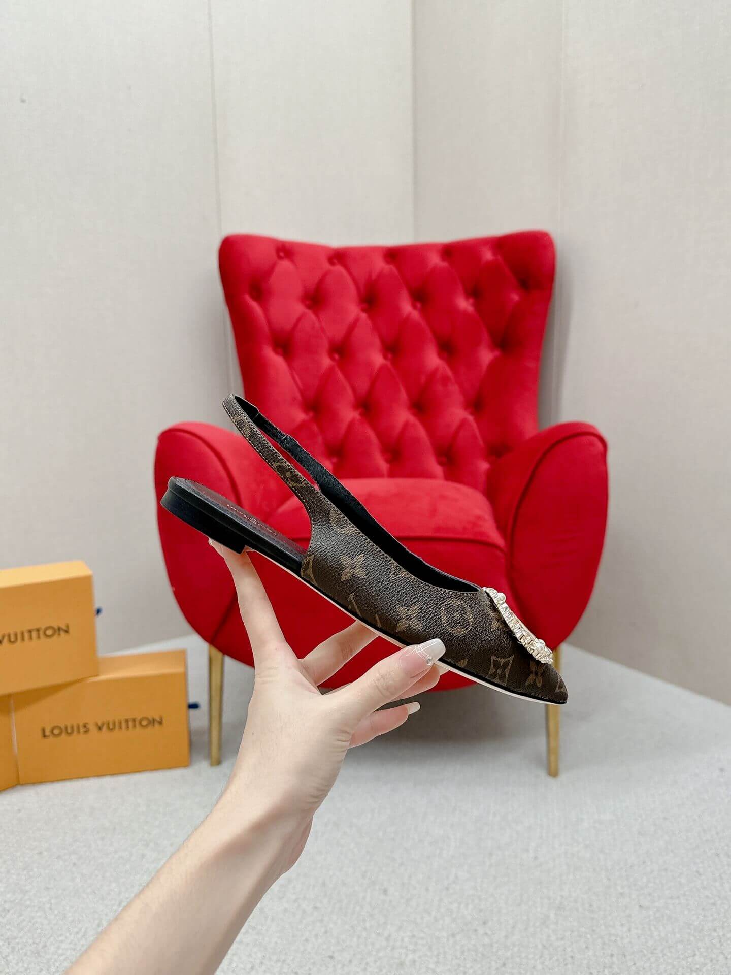 a pair of Louis Vuitton Classic Monogram Crystal Slingback Flats on a box