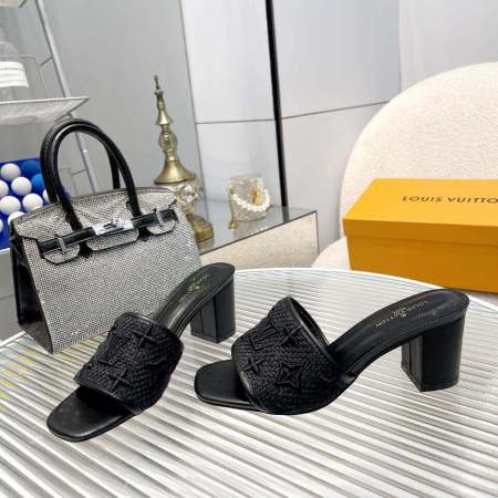 a pair of Louis Vuitton LV Mare Mule in classic black, on a yellow box