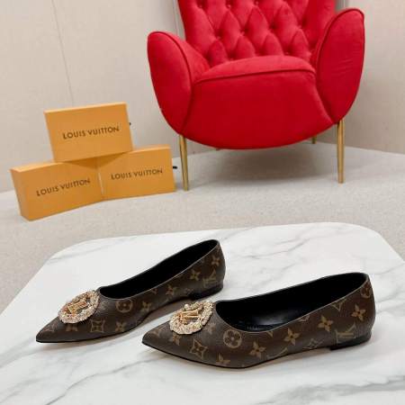 a pair of Louis Vuitton Revival Mule in Monogram Canvas – Crystal‑Embellished Flat Shoe on a box
