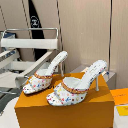 a pair of Louis Vuitton x Murakami 6AM Mule on a box