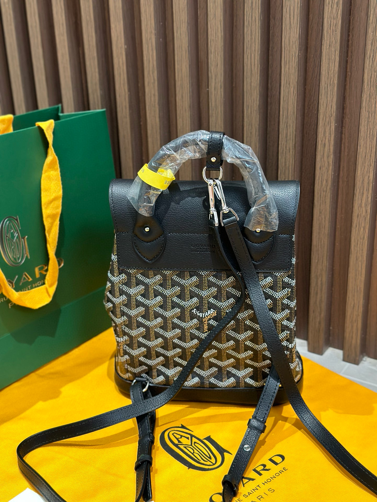 Goyard Black Goyardine Canvas Alpin Mini Backpack, made in France, 23 × 9.5 × 19 cm, with black leather trim and versatile straps.
