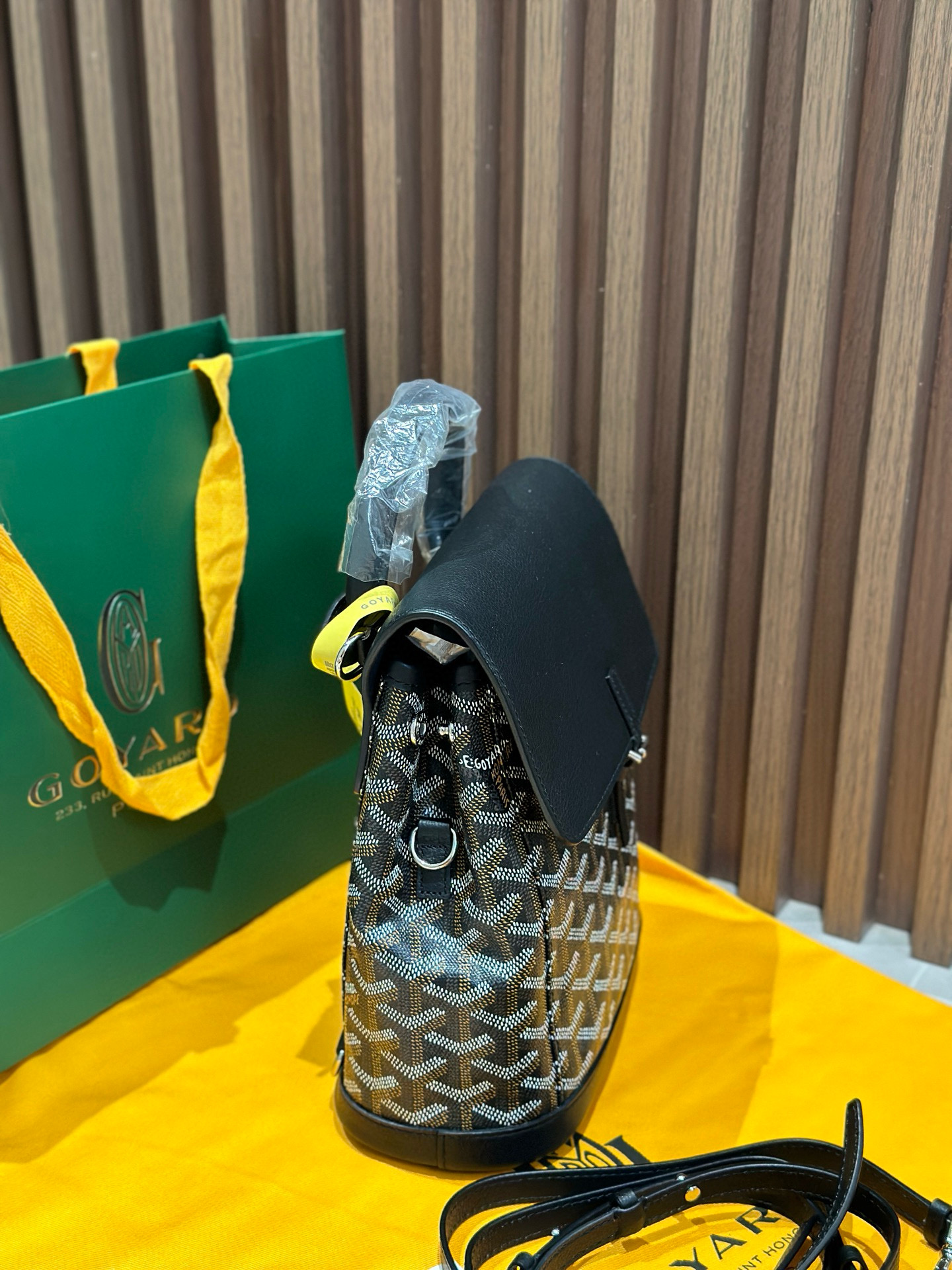 Goyard Black Goyardine Canvas Alpin Mini Backpack, made in France, 23 × 9.5 × 19 cm, with black leather trim and versatile straps.