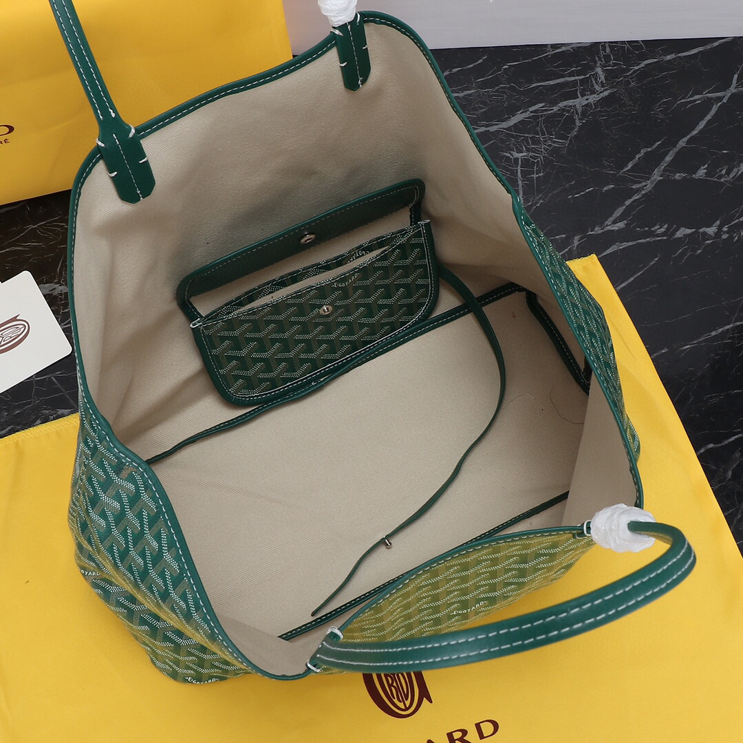 Goyard Green Saint GM Canvas Tote Bag showing its cream lining and attached green pouch.