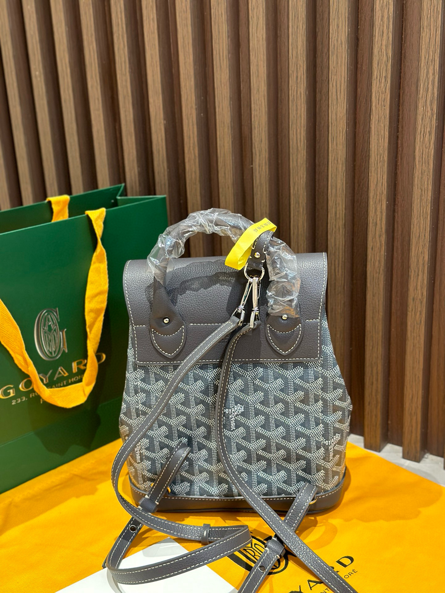 Goyard Grey Goyardine Canvas Alpin Mini Backpack, made in France, 23 × 9.5 × 19 cm, grey leather trim with versatile straps.