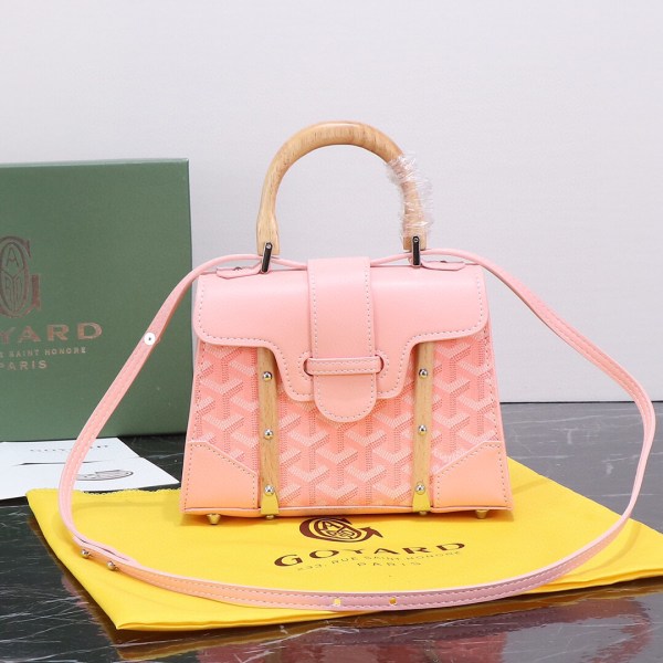 Goyard Pink Goyardine Coated Canvas and Leather Saigon MM Top Handle Bag with wooden handle and blush leather trim.