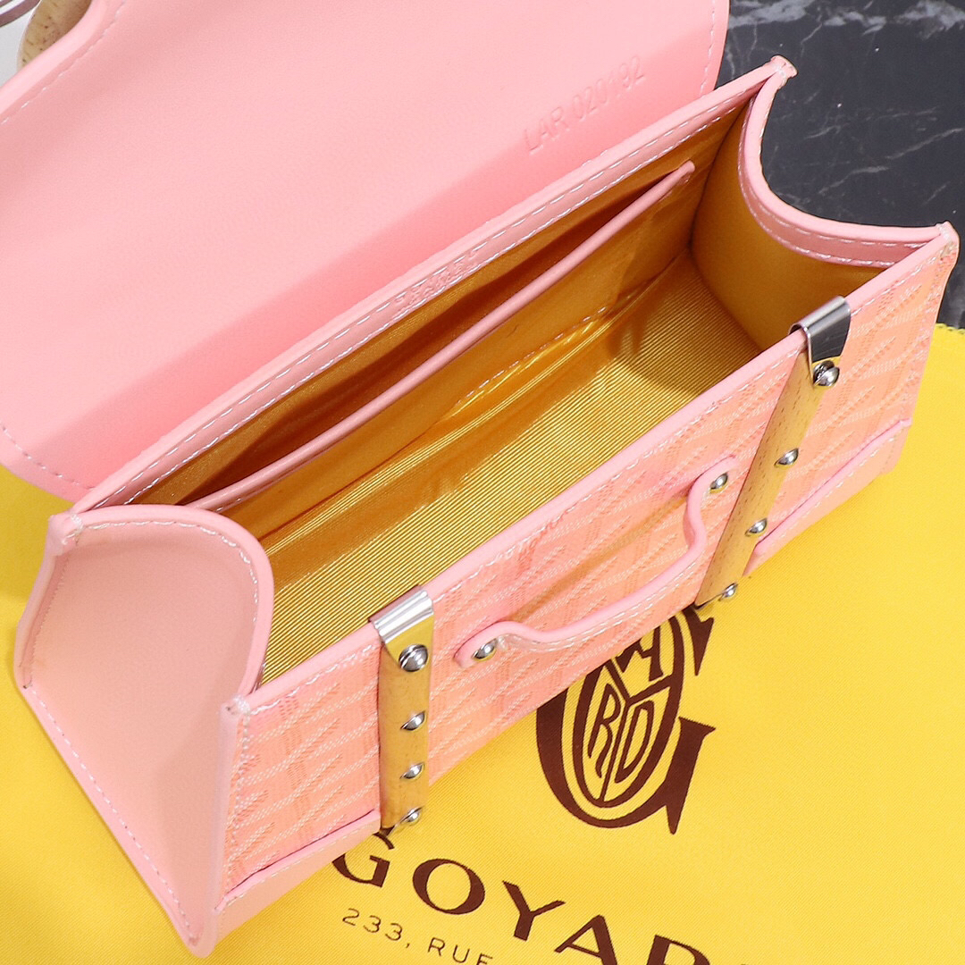 Goyard Pink Goyardine Coated Canvas and Leather Saigon MM Top Handle Bag with wooden handle and blush leather trim.