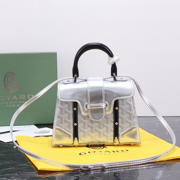 Goyard Silver Goyardine Coated Canvas and Leather Saigon MM Top Handle Bag with black wooden handle and metallic body.