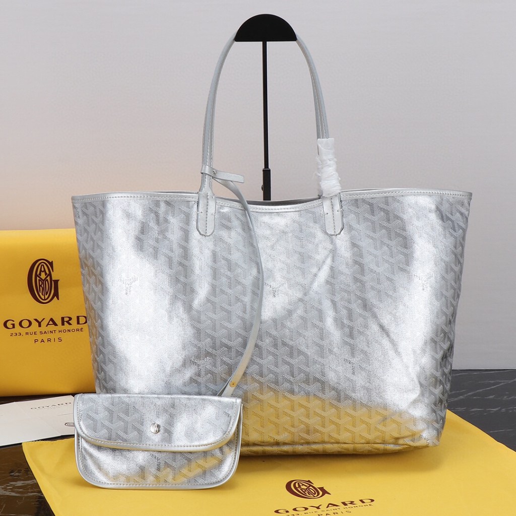 Goyard Silver Saint GM Canvas Tote Bag with a matching metallic silver pouch.