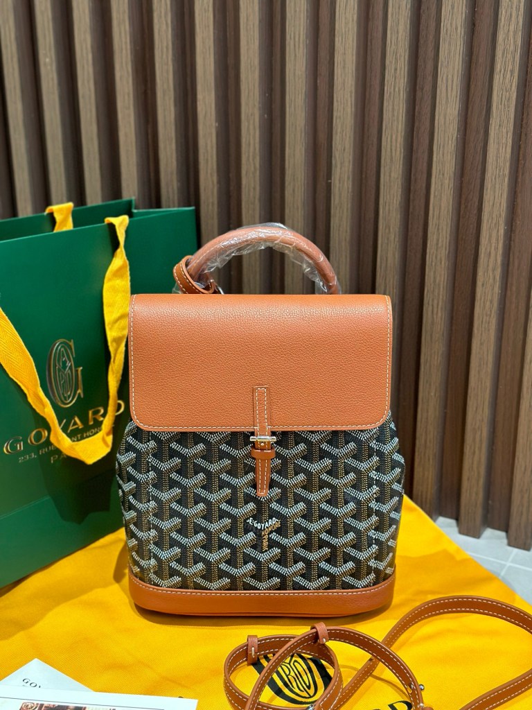 Goyard Tan Goyardine Canvas Alpin Mini Backpack, made in France, 23 × 9.5 × 19 cm, with adjustable straps for versatile styling.